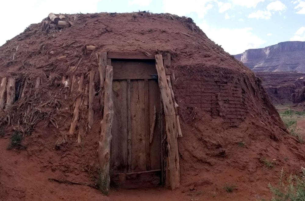 A hut made of of mud at Base Base Camp Adventure Lodge