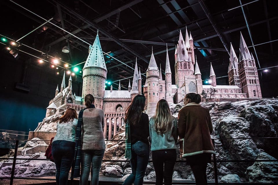 A family enjoying the Warner Brother Studios Making Of Harry Potter tour in London, England, one of the best destinations for kids who love Harry Potter! 