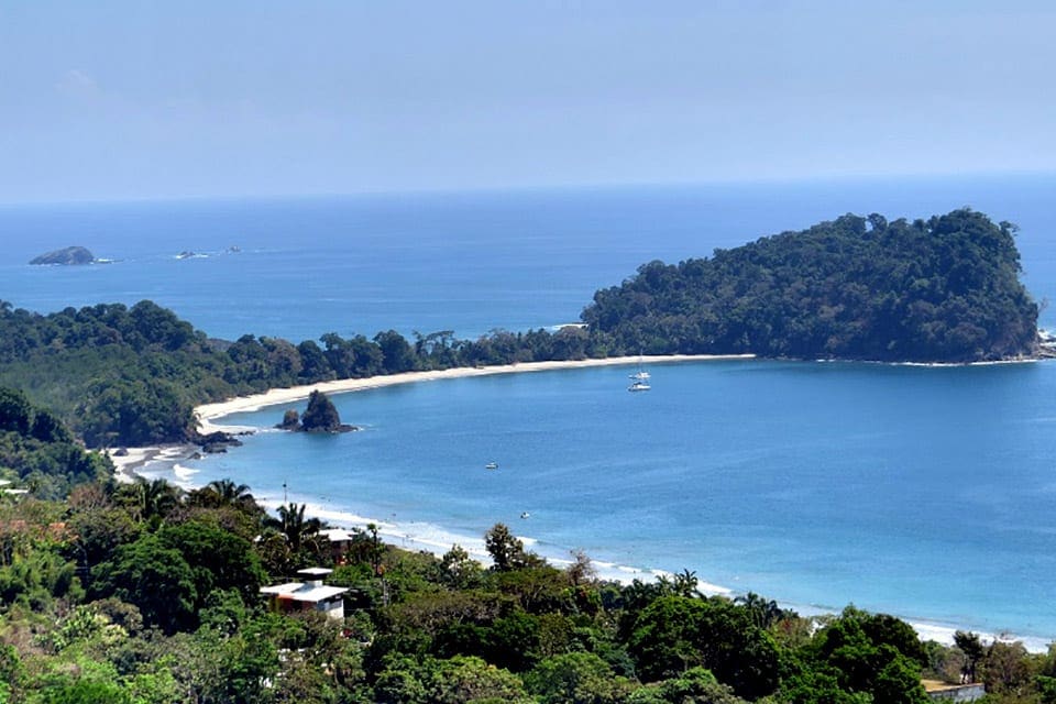 A view of the beach and shoreline in Manuel Antonio National Park, one of the best places to visit in Costa Rica with kids.