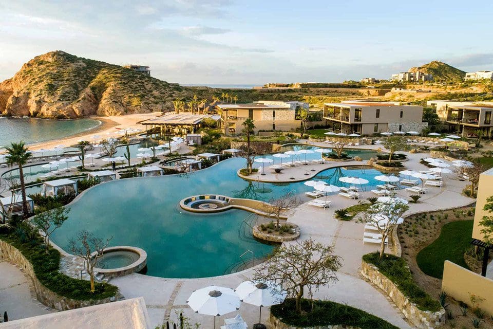 Aerial view of the pools and bay at Montage Los Cabos, one of the best resorts in Mexico for families.