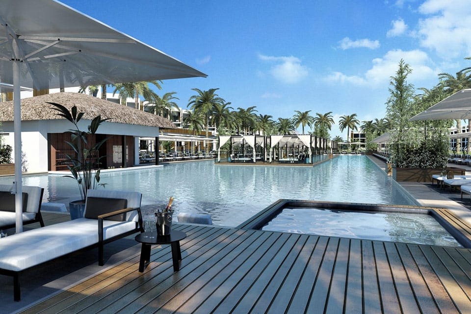 A pool deck and loungers face one of the pools at the Finest Playa Mujeres.