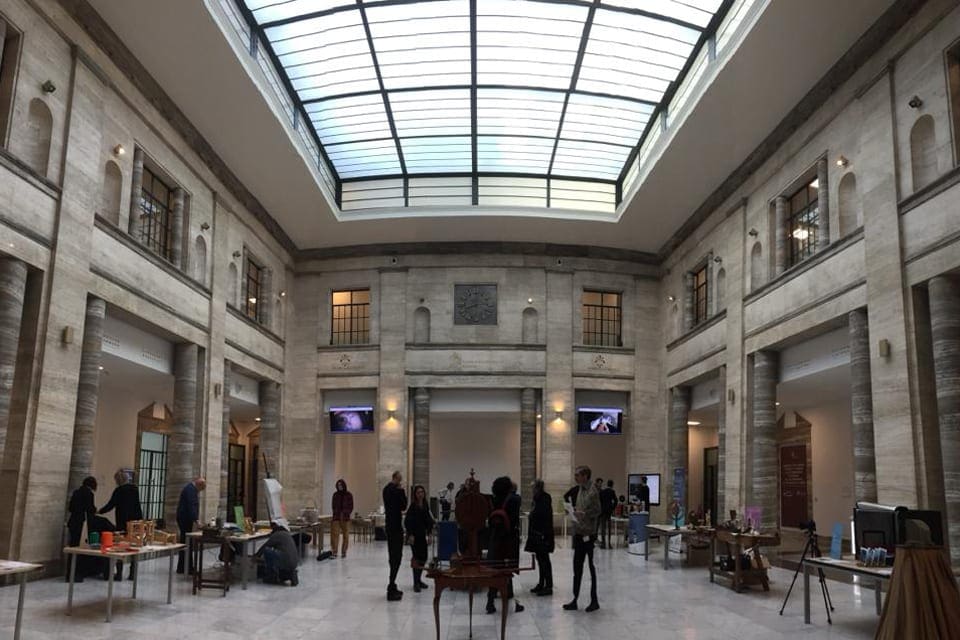 Inside the large entrance to Galileo Museum, with a huge skylight overhead.