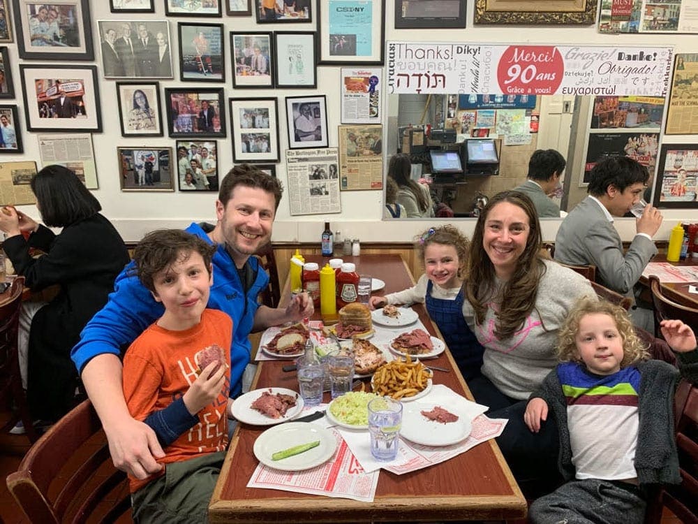 A family of five enjoys one of the best restaurants in Montreal for families while visiting.