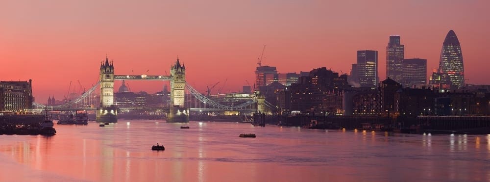 River Thames at sunset displaying hues of yellow and red.