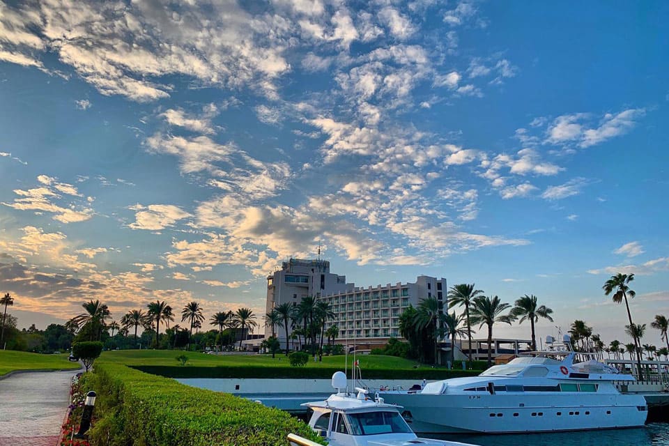 A view of JA Palm Tree Court beyond the marina, one of the best family hotels in Dubai.