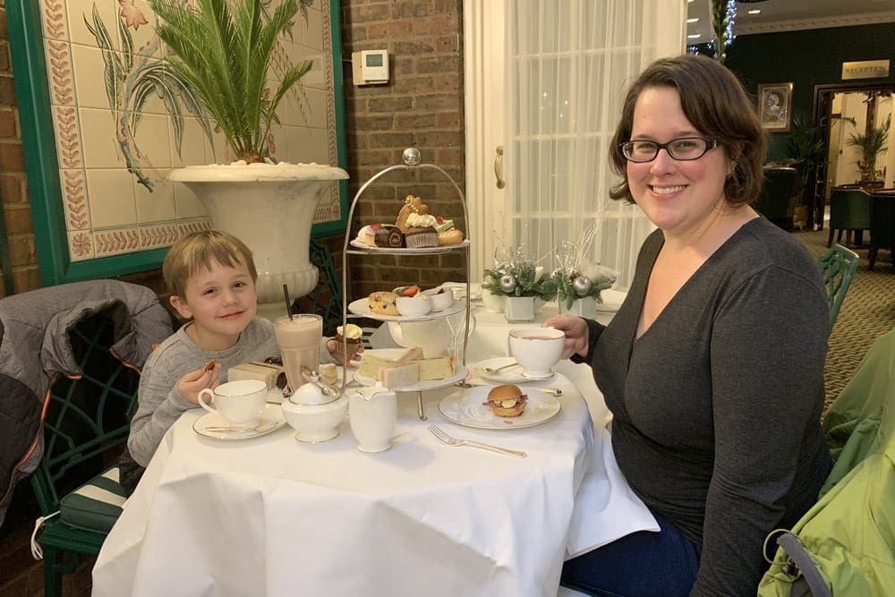 Mom and son in London enjoying Tea Time.