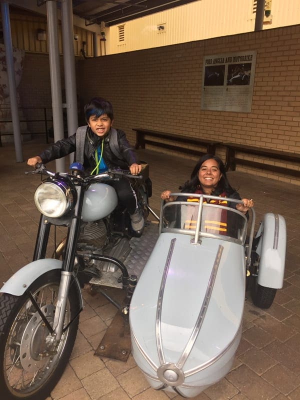 mother and son on motorcycle and sidecar