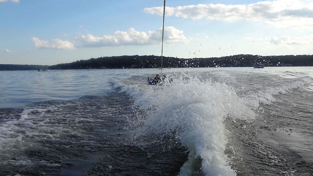 Chidlren tubing behind a boat at Lake Hopatcong.