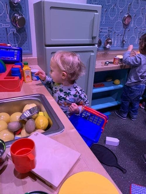 Small boy plays at the American History Museum in Washington D.C.