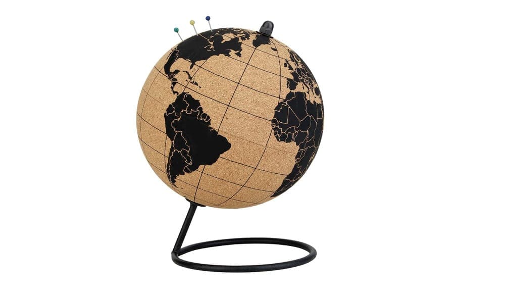A product shot of a cork globe with countries around the world shown in black.