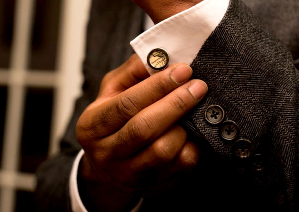 Father wearing cuff links, one of the best gifts for dads who travel.