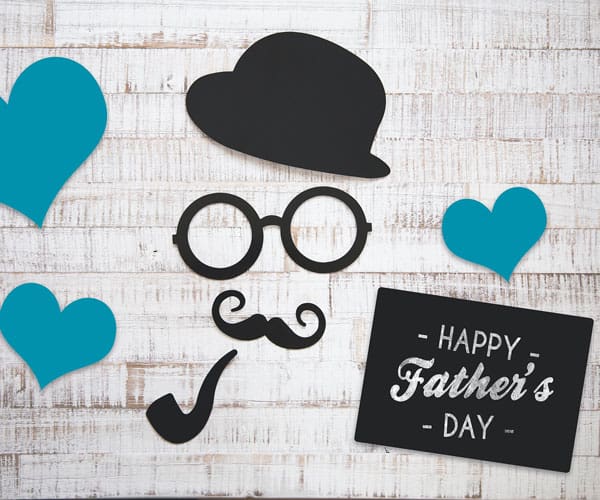 Graphic of Happy Fathers Day and a hat, mustache, cigar