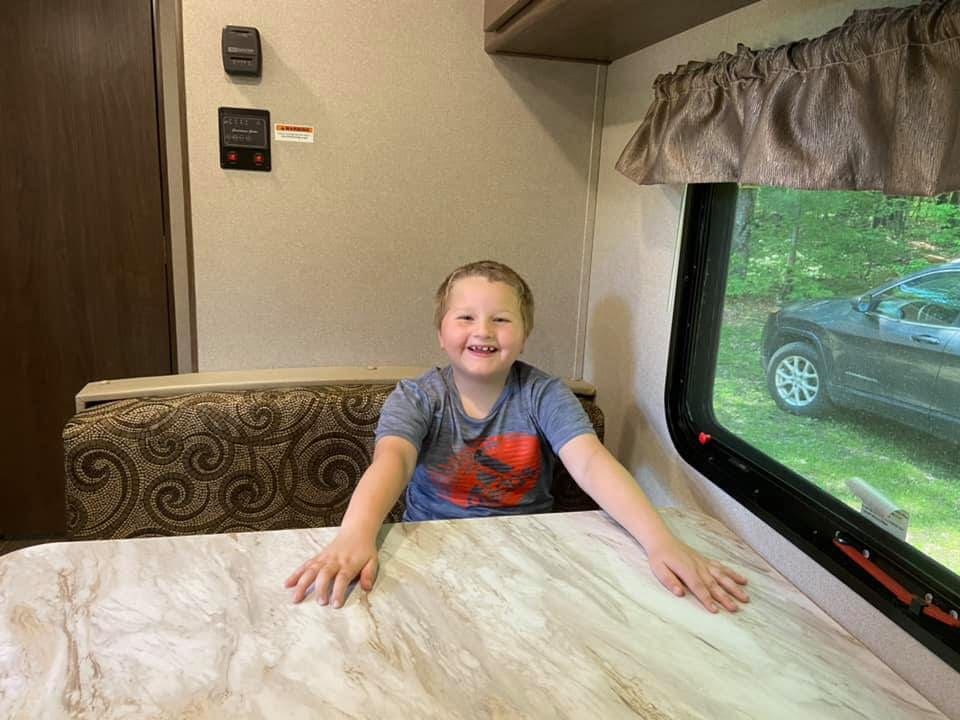 Boy sitting inside the RV