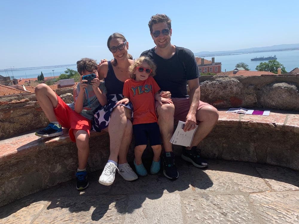 Family posing in St Georges-Castle while exploring the area.