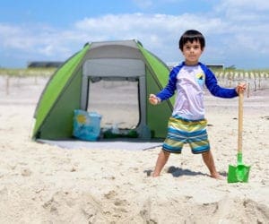 Little boy in front of the beach tent on fire Island beach