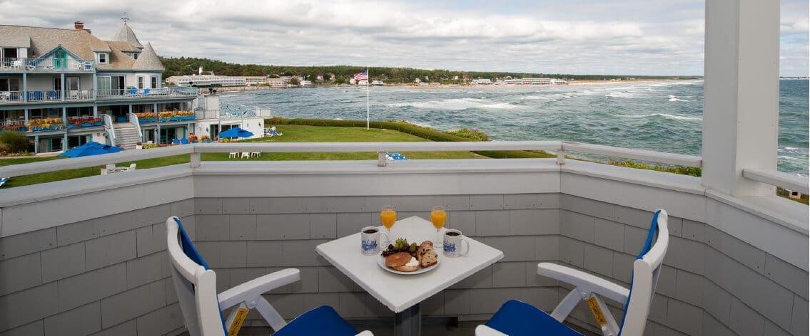 A balcony breakfast table overlooking the ocean at Beachmere Inn.