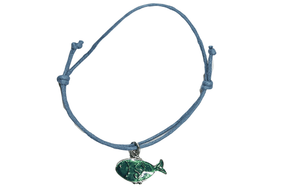 A small charm bracelet, featuring a green fish.
