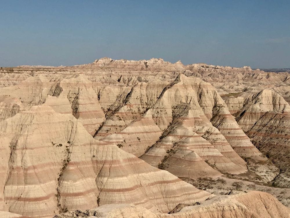 A stunning view of the Badlands, the perfect place to survey the scenery on your Family-Friendly Itinerary to the Badlands.