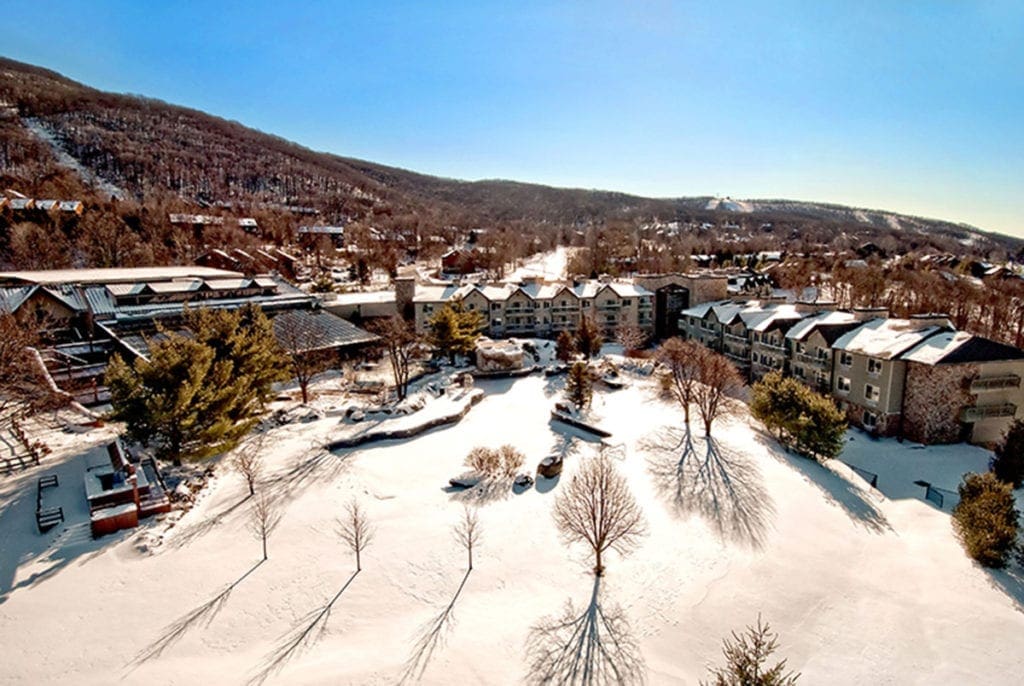 An aerial view of Crystal Springs Resort on a sunny, winter day. This is one of the best family resorts near NYC for a winter getaway. 