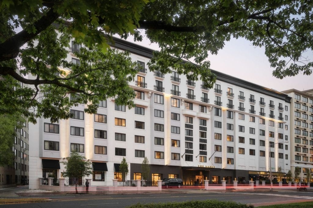 A view of The Darcy at dusk, one of the best hotels on this DC itinerary for families with babies or toddlers.