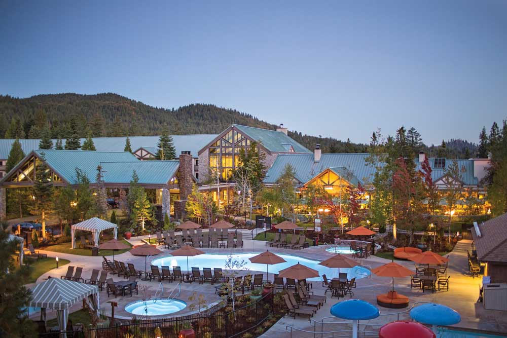 Lodging outside Yosemite National Park view of pool and chairs.