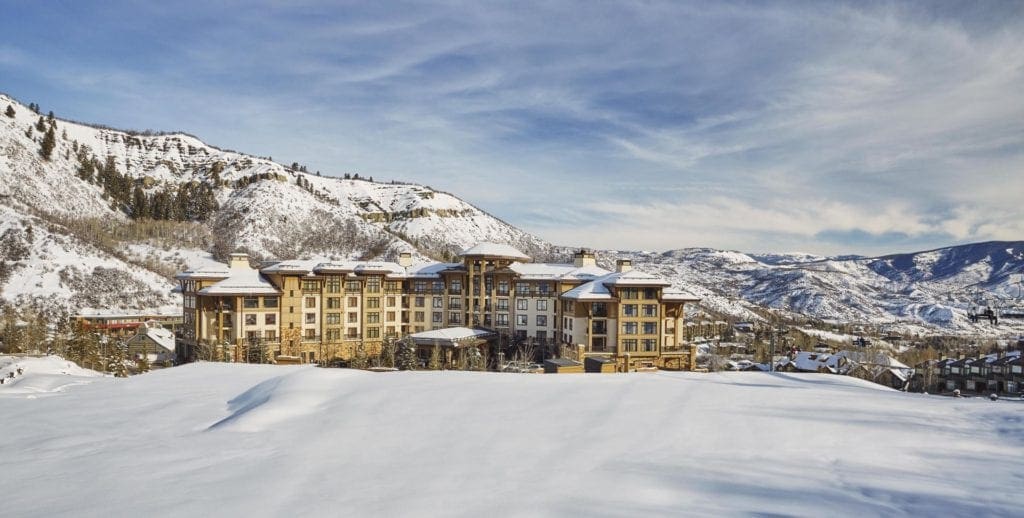 The Viceroy Snowmass Luxury Hotel & Resort on a sunny, snowy day, one of the best best ski in ski out resorts in Colorado.