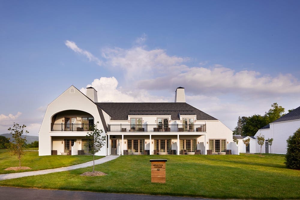 The main building at Miraval Berkshires Resort & Spa, one of the best mom's weekend getaway locations, a posh white building with a charming ambiance.