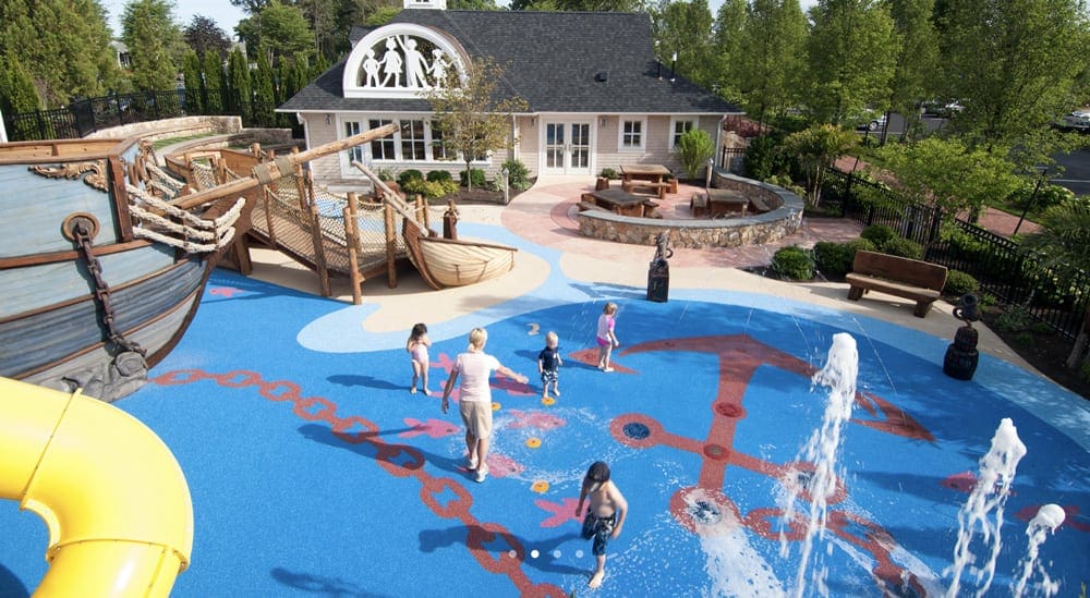 One of the best beach resorts in the Northeast for families, Wequassett Resort and Golf Club featuring this fantastic splash pad ideal for kids on a sunny day.