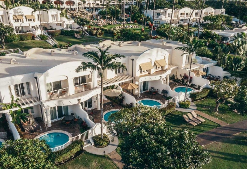 Severalla white villas with private pools on a sunny day at Fairmont Kea Lani, one of the best family hotels in Maui.