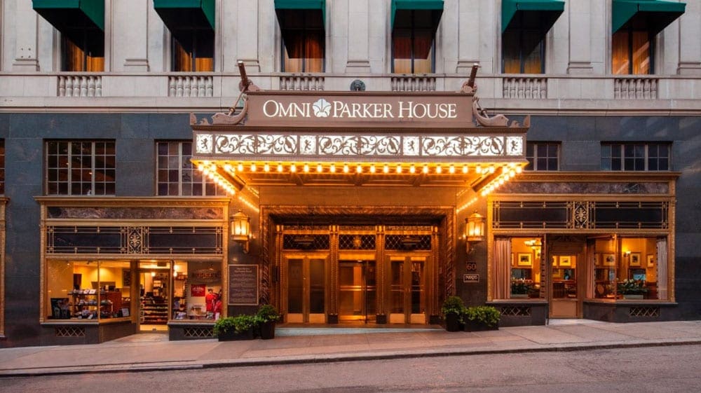 The brightly lit entrance to the Omni Parker House, one of the best hotels in boston for families