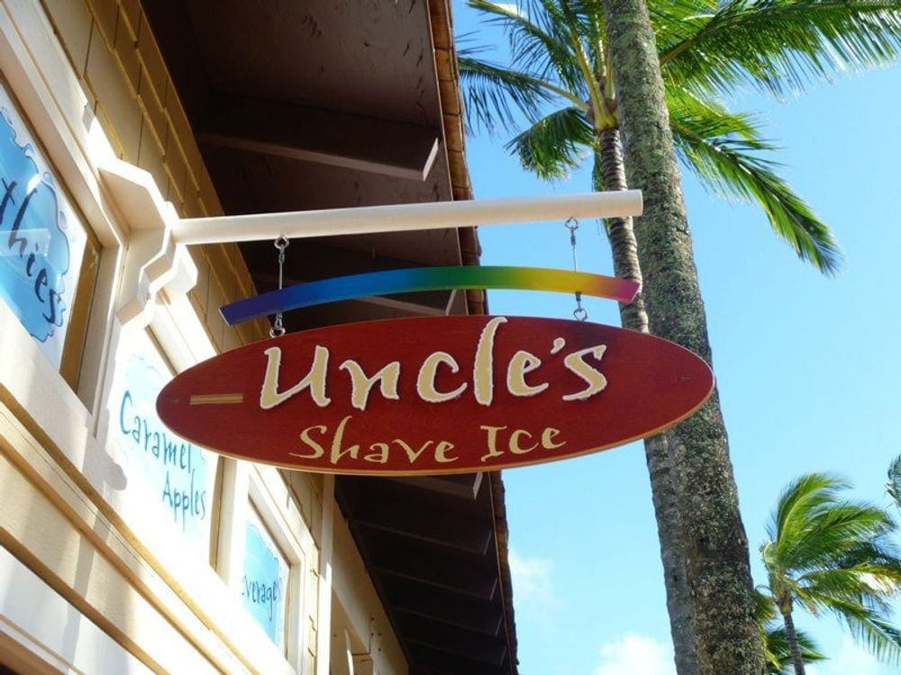 A sign reads "Uncle's Shave Ice".