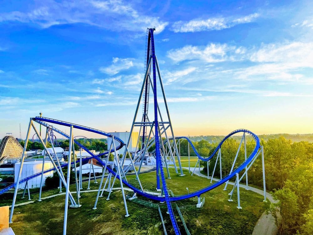 A huge blue roller coaster stands proudly on a sunny day at Kings Island, one of the best weekend getaways near Chicago for families