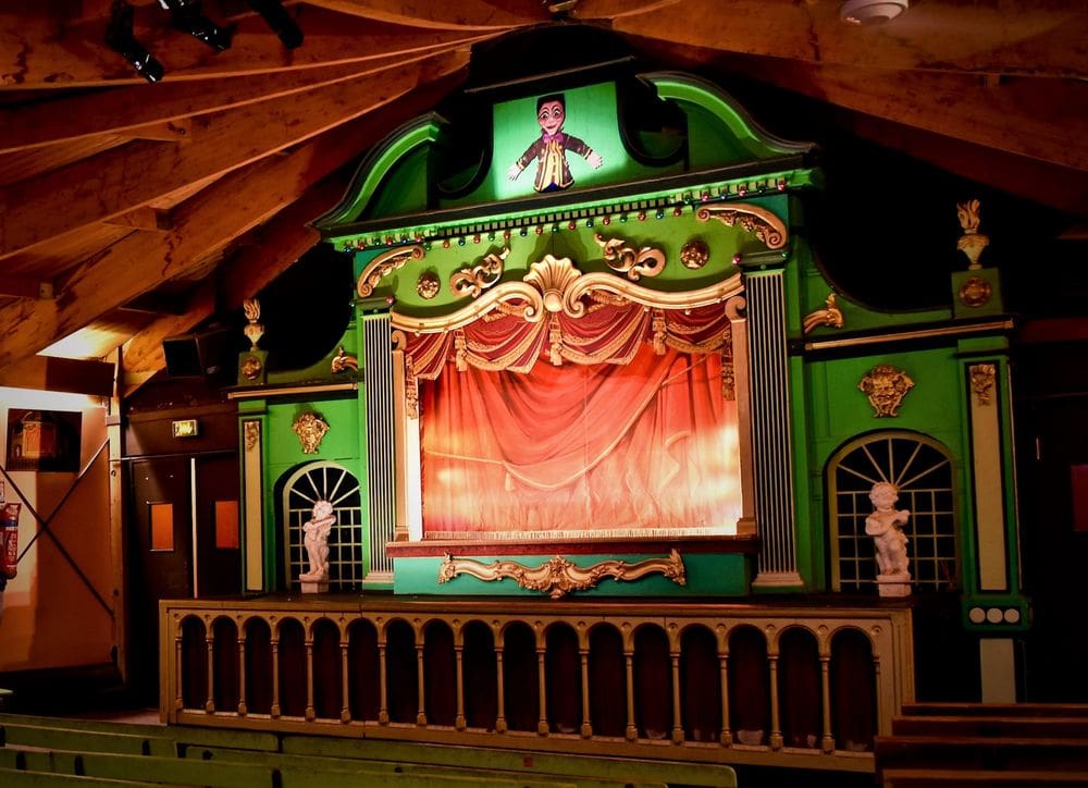 The small indoor stage at the Marionnettes au champ de Mars - Le Théâtre des Marionnettes parisiennes.