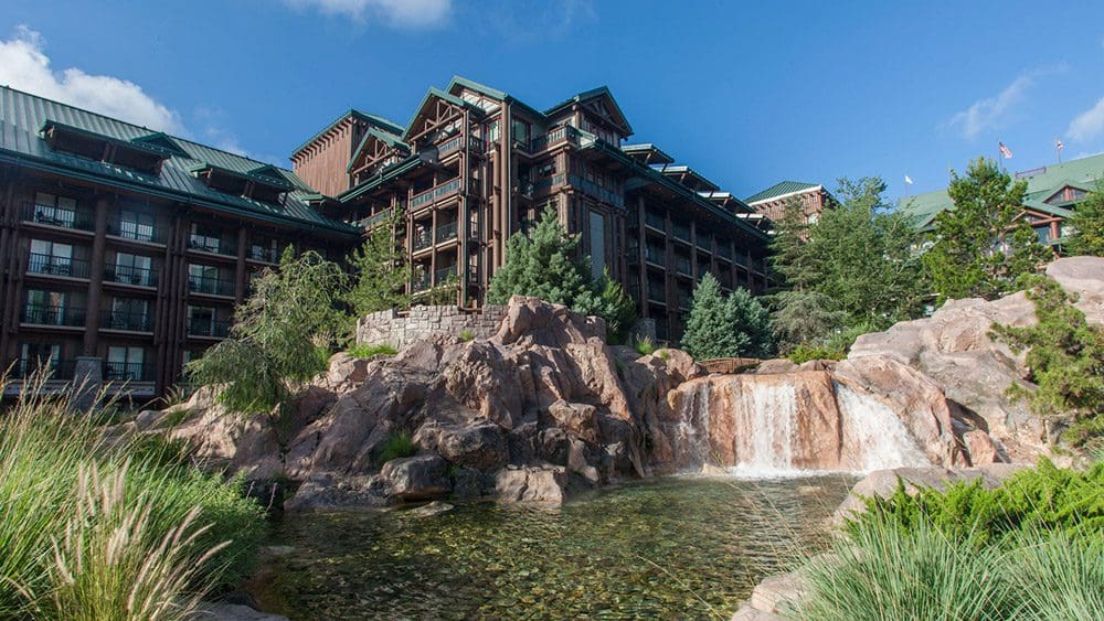 The exterior of the Disney Wilderness Lodge, across from its on-site pond.