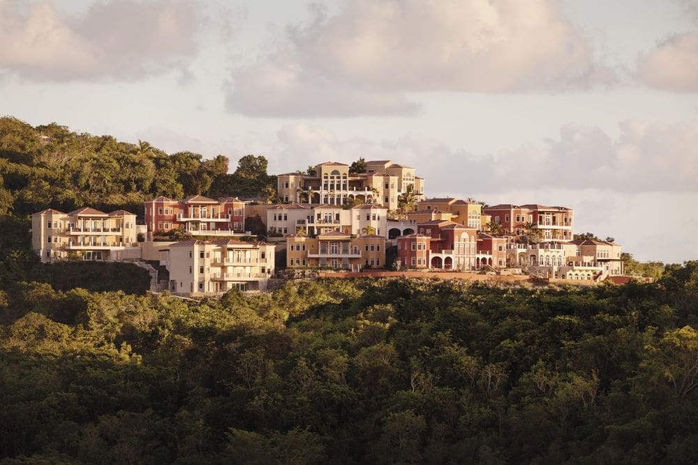 A view of the The Hills St. John, featuring villa-style accommodations resting on a hill.