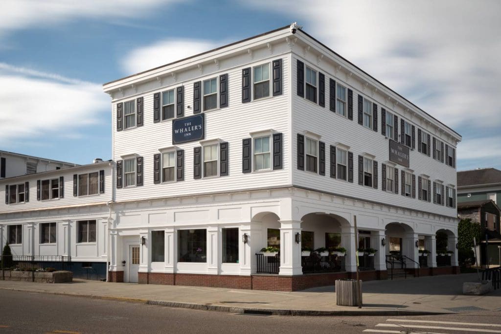 The exterior to the tall, white The Whaler’s Inn, one of the best hotels in Connecticut for families.