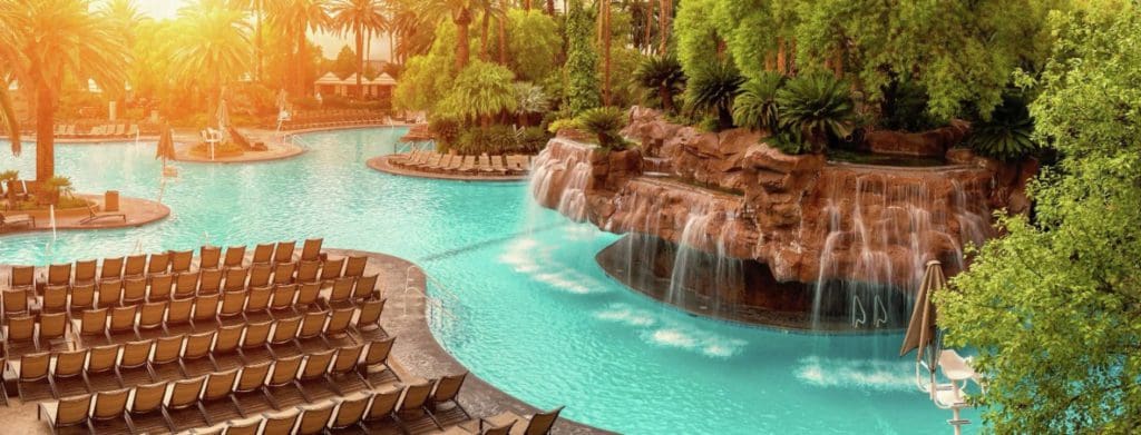 The lazy river at The Mirage at sunset, featuring waterfalls into the lazy river.