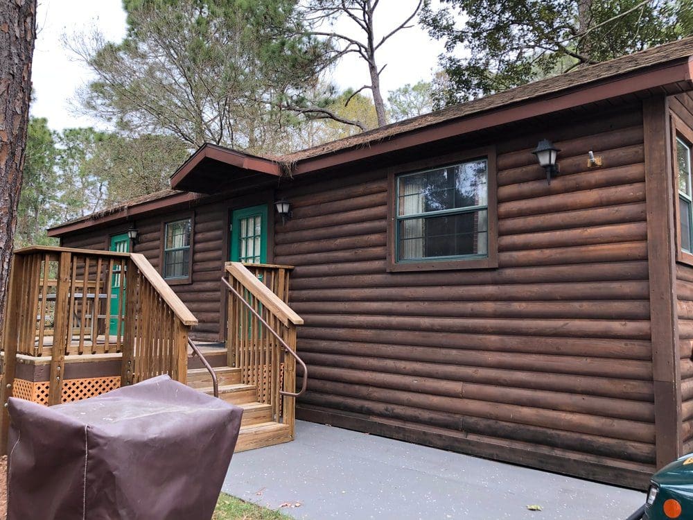 A close up of one of the cabins at Fort Wilderness Resort, one of the best Disney moderate resorts for families.