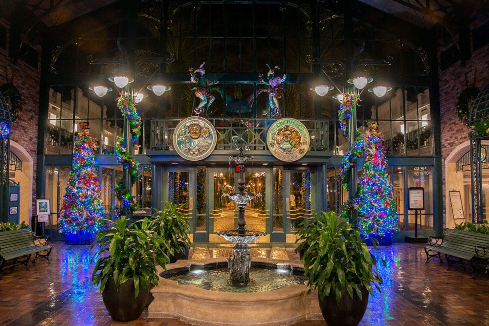 Inside the colorful, NOLA-inspired lobby at Disney's Port Orleans - French Quarter Resort.