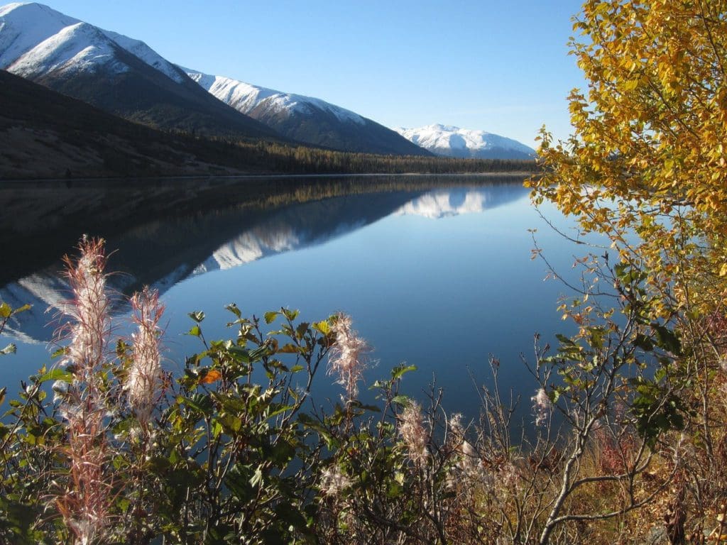 A view of Reflection Lake near Anchorage, showcasing why its called such. The mountains and trees are reflecting beautifully off the water.