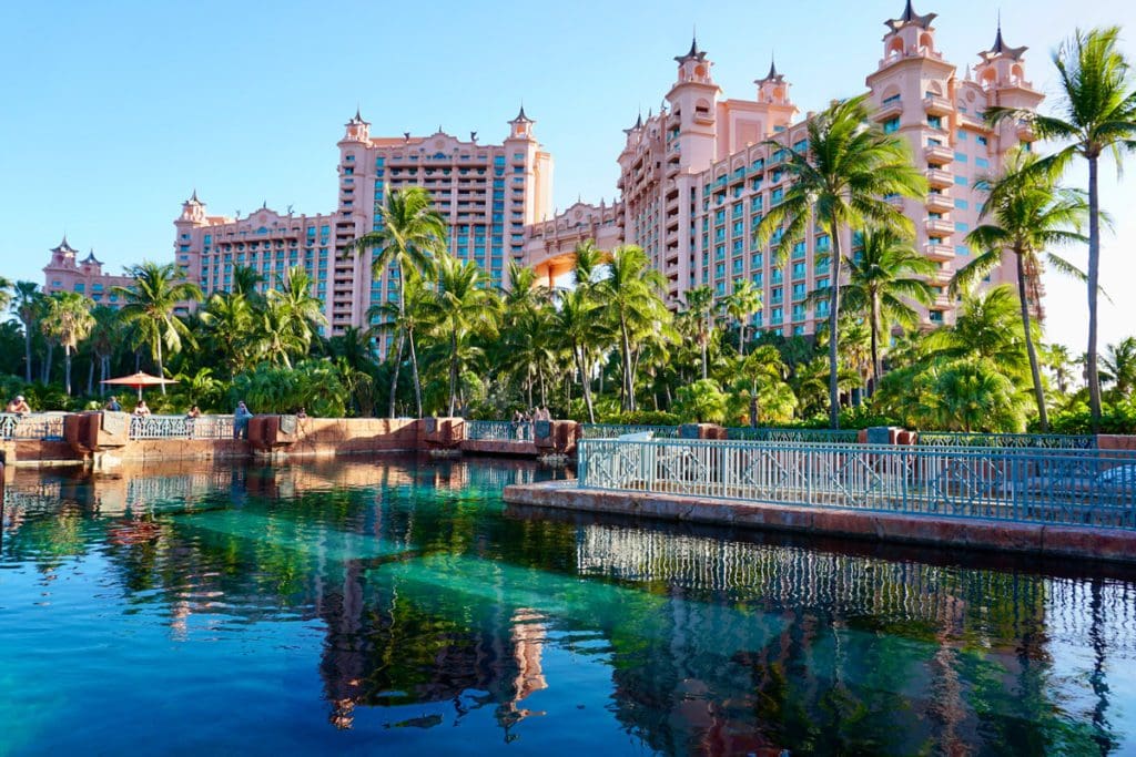 A view of building and grounds of The Royal, across an on-site pond.