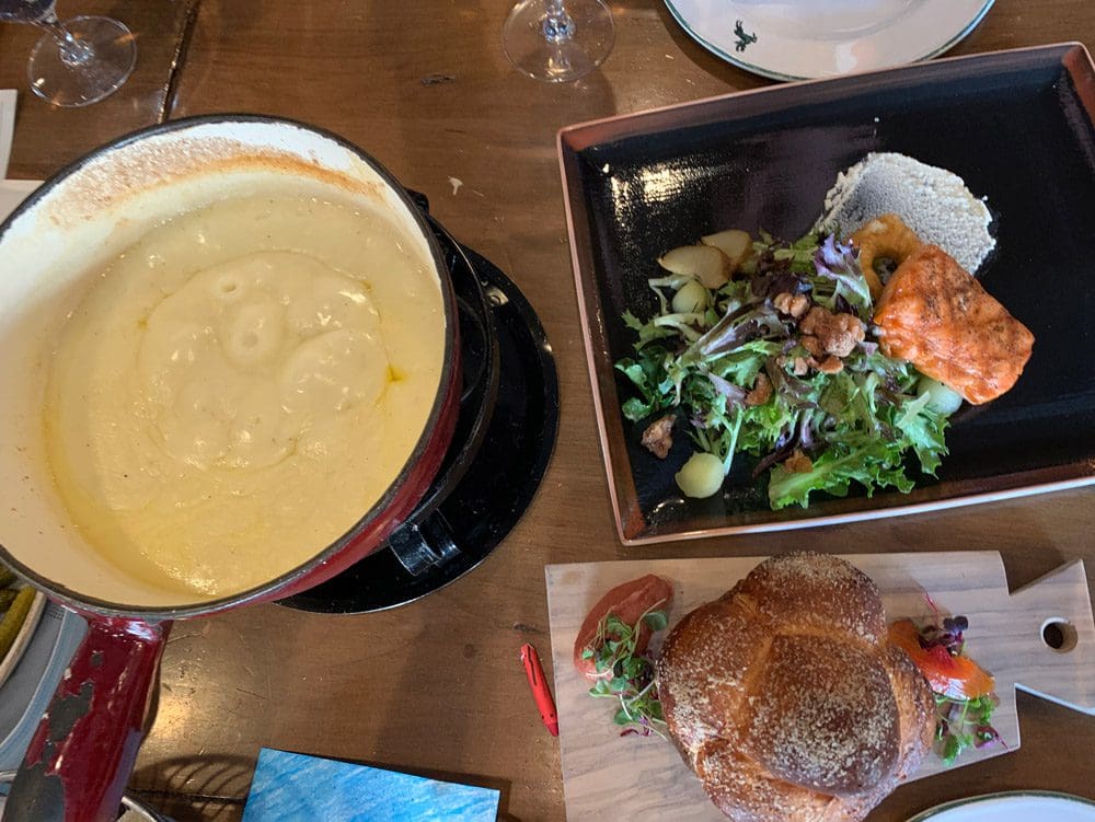 A view of a table of food at the Goldener Hirsch restaurant.