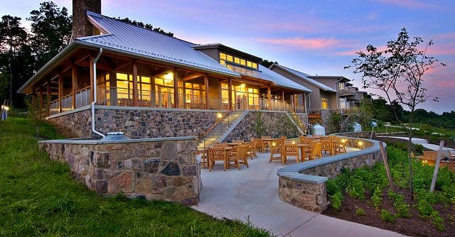 The entrance to the main building at The Nature Inn at Bald Eagle, one of the best eco-friendly hotels in the United States for families.