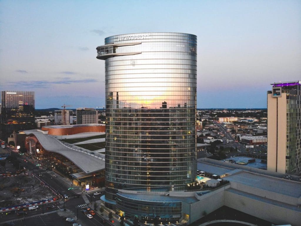 A view of The JW Marriott Nashville at sunrise, as well as the surrounding buildings.