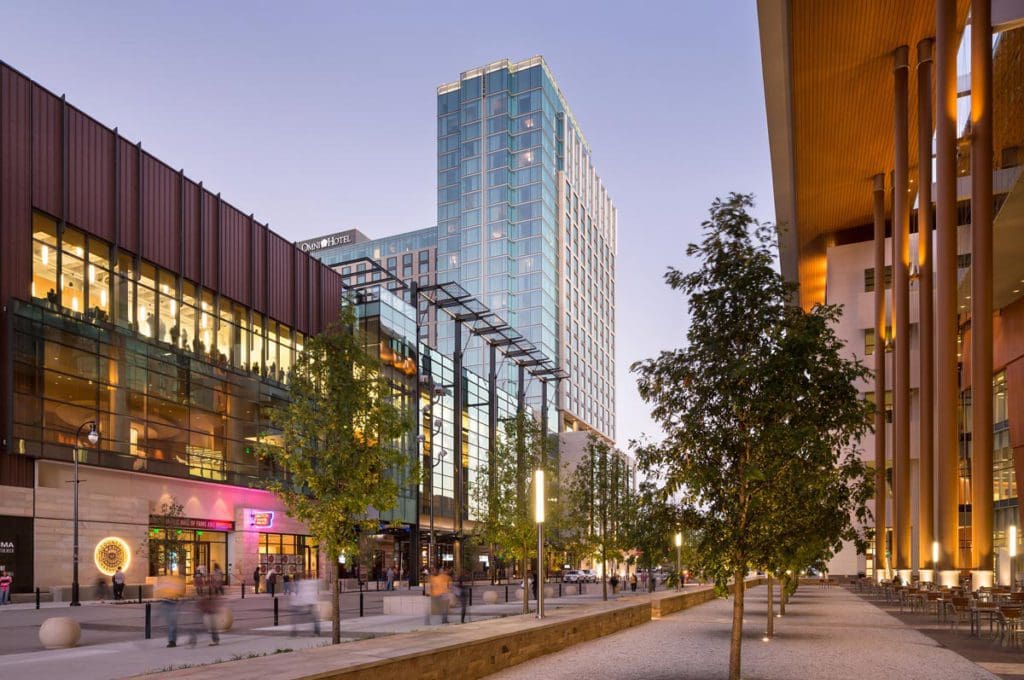 A view of a Nashville street, featuring the Omni Nashville Hotel, one of the best Nashville hotels for families.