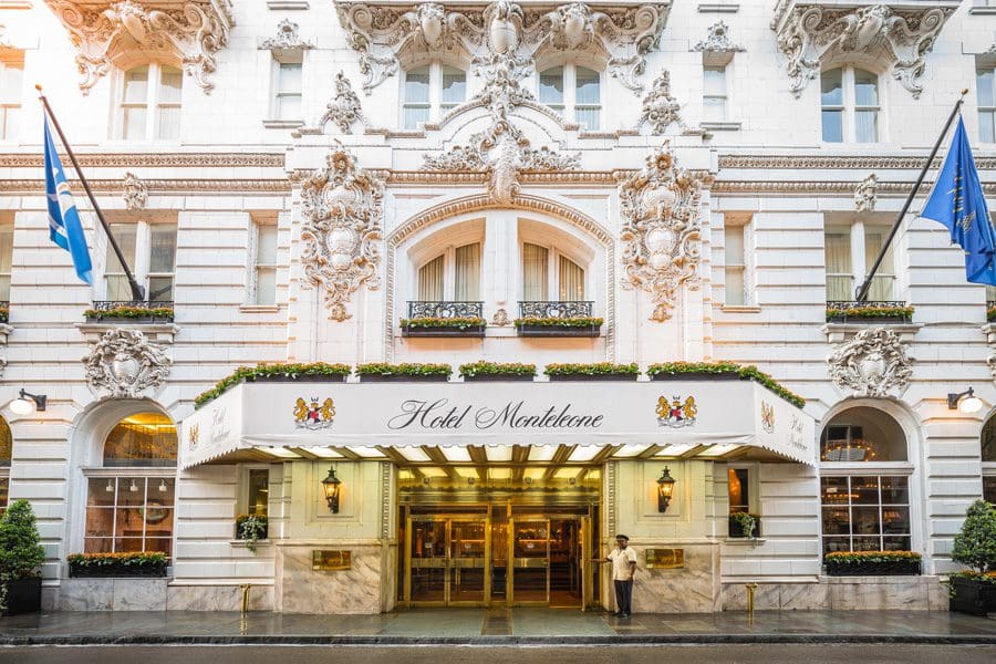 The grand entrance to the Hotel Monteleone, French Quarter Hotel, with a doorman out front.