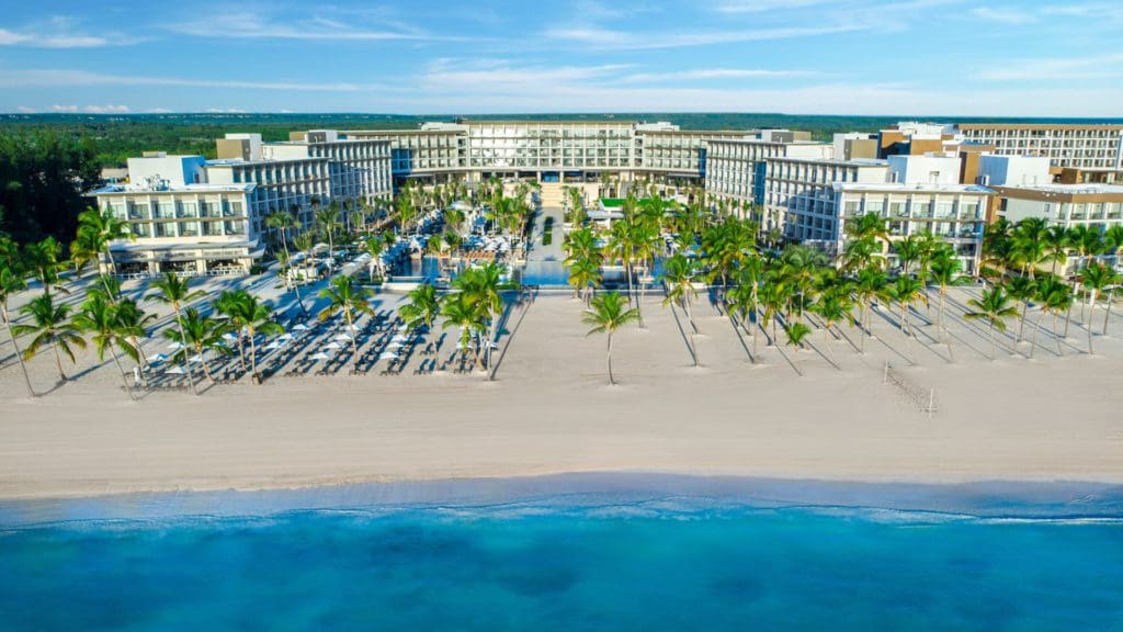 An aerial view of the ocean, beach, and resort buildings at Hyatt Ziva Cap Cana, one of the best all-inclusive resorts in the Caribbean for families.