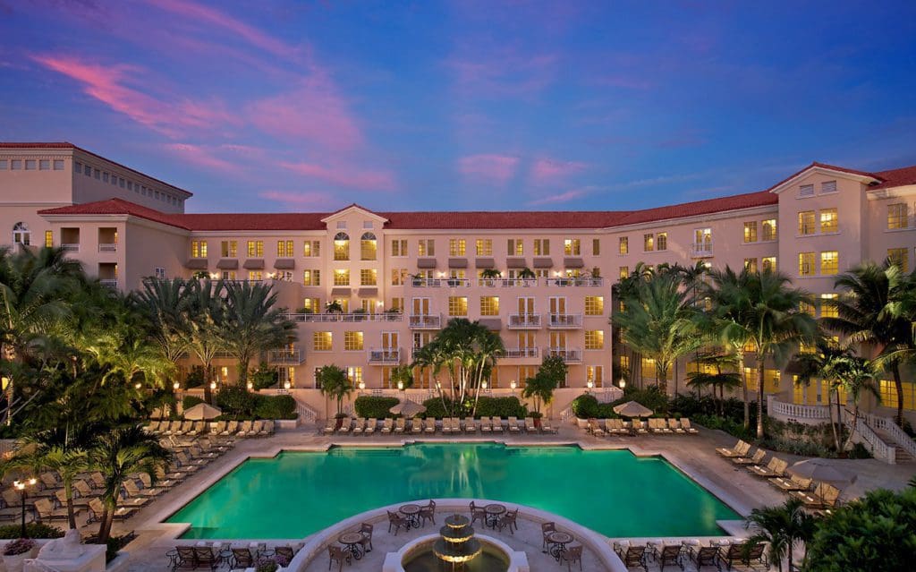 The exterior entrance to the JW Marriott Turnberry Resort & Spa, with a pool out front, one of the Best Marriott Properties in the U.S. for a Family Vacation.