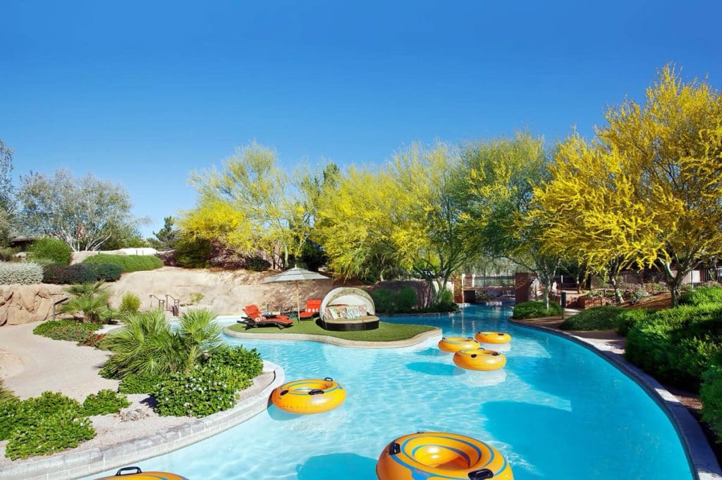 The lazy river with several floating tubes on the water at The Westin Kierland Resort & Spa, one of the Best Marriott Properties in the U.S. for a Family Vacation.
