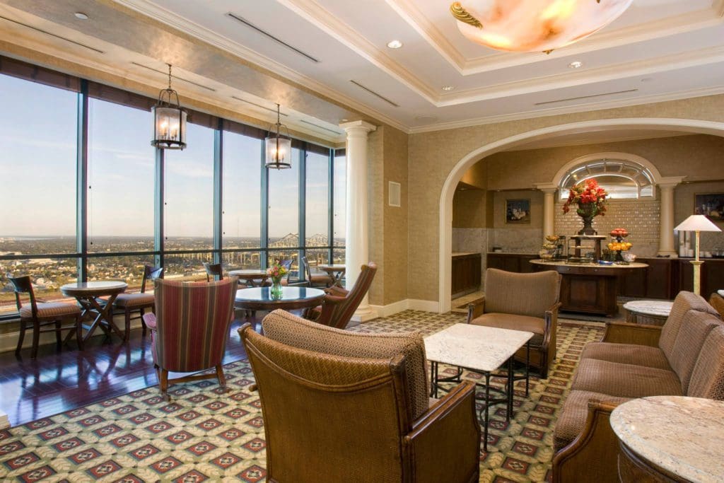 Inside the lobby of the , Hilton New Orleans Riverside, with plush furnishings.